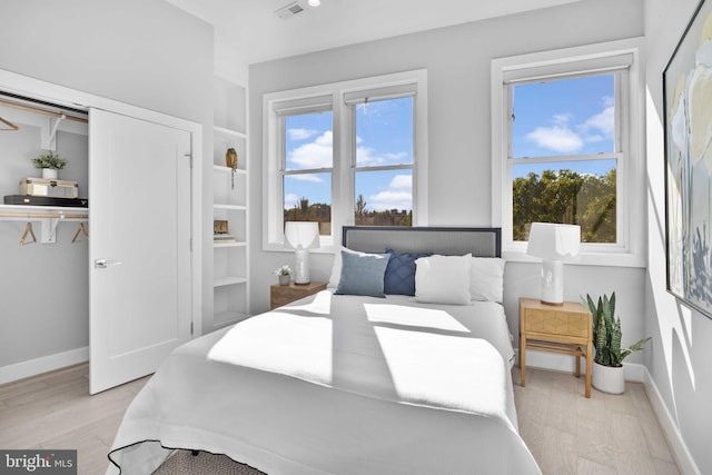 bedroom featuring light hardwood / wood-style floors