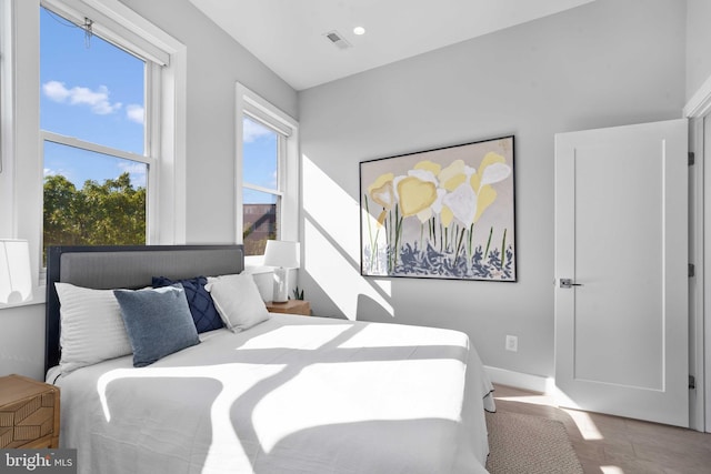 bedroom featuring hardwood / wood-style floors