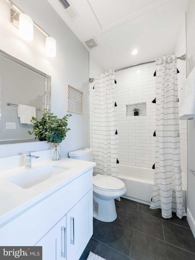 full bathroom featuring shower / tub combo with curtain, vanity, toilet, and tile patterned floors