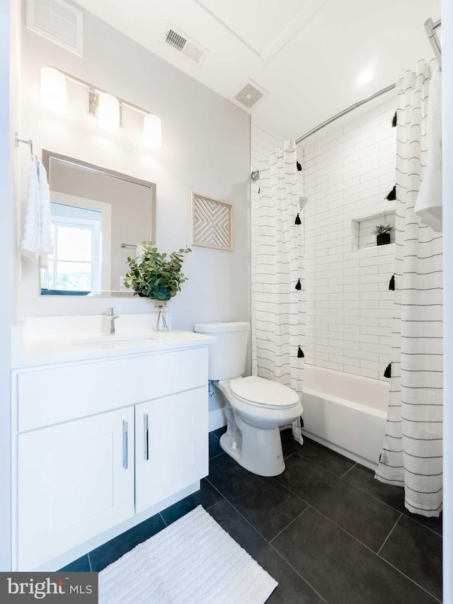 full bathroom featuring shower / bathtub combination with curtain, vanity, tile patterned flooring, and toilet