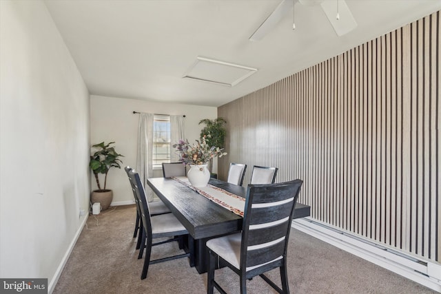 dining room featuring ceiling fan and carpet floors