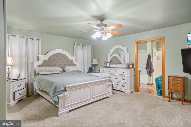 bedroom featuring ceiling fan and light carpet