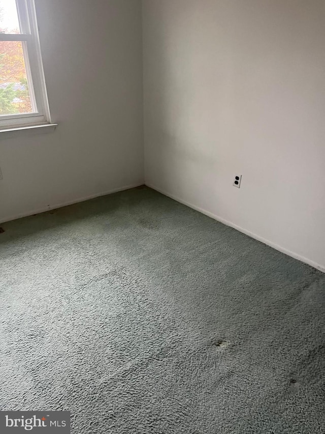 170 Channing Dr, Bear, DE 19701 - carpeted empty room with baseboards