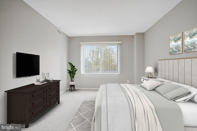 bedroom featuring light colored carpet and lofted ceiling