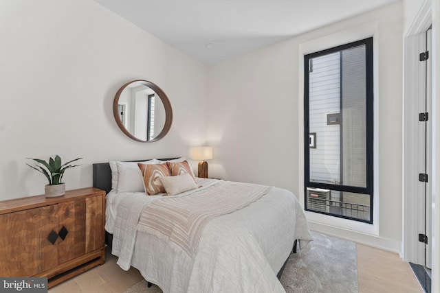 bedroom featuring light wood-type flooring