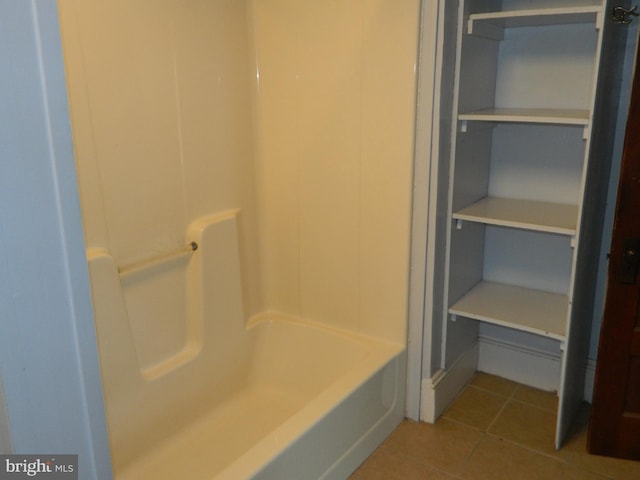 bathroom with tile patterned flooring