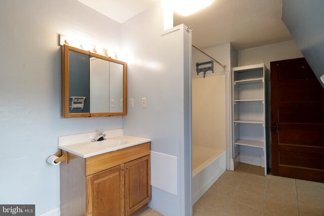 bathroom with separate shower and tub and vanity