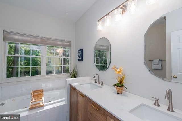 bathroom with a relaxing tiled tub and vanity