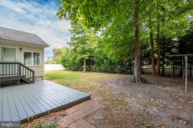 view of yard with a wooden deck