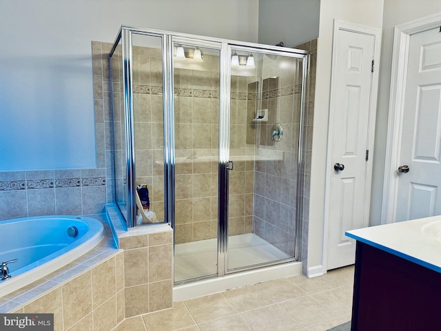 bathroom with tile patterned floors, vanity, and plus walk in shower