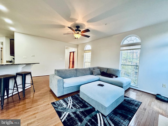 living room featuring plenty of natural light and light wood-type flooring