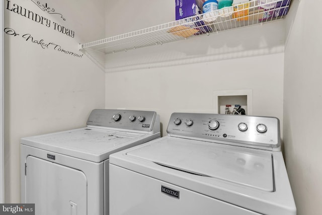 laundry area with washer and dryer