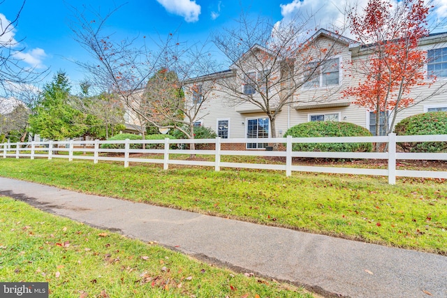 exterior space featuring a front lawn