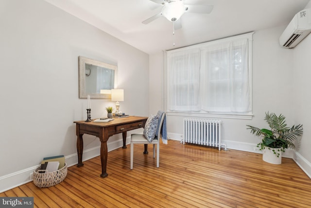1411 W St, Annapolis, MD 21401 - office featuring radiator heating unit, light wood-type flooring, ceiling fan, a wall unit AC, and baseboards