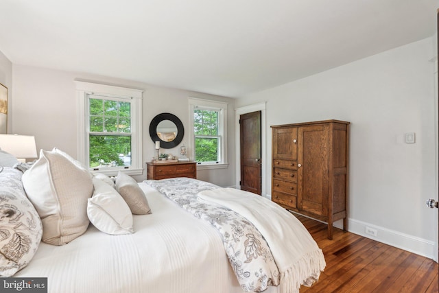 1411 W St, Annapolis, MD 21401 - bedroom featuring dark wood-style flooring and baseboards