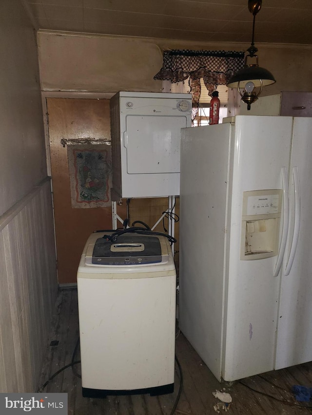 laundry area featuring electric panel and washer / clothes dryer