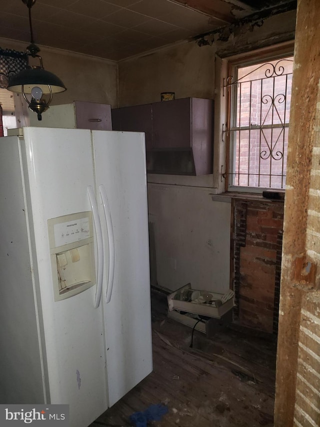 kitchen featuring white refrigerator with ice dispenser and wood-type flooring