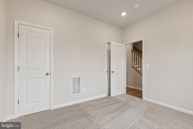 spare room with carpet flooring