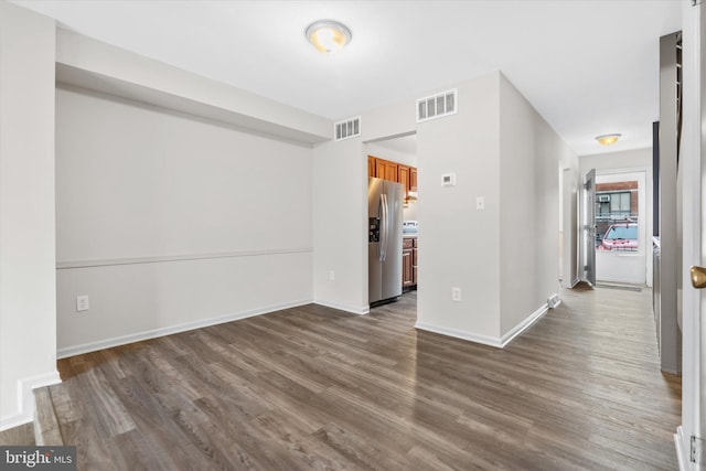 empty room featuring dark hardwood / wood-style floors