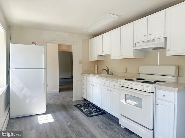 kitchen featuring white cabinets, white appliances, dark wood-type flooring, and sink