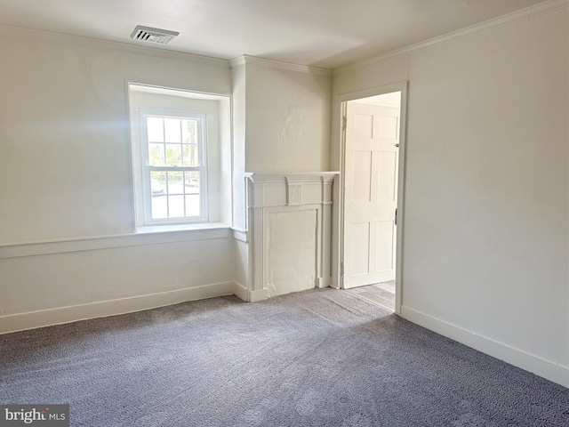 unfurnished living room with light colored carpet and ornamental molding