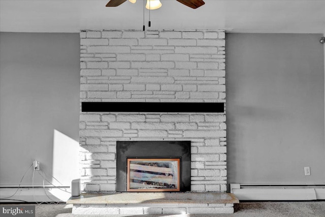 room details featuring carpet, a fireplace, ceiling fan, and baseboard heating