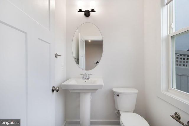 bathroom featuring toilet