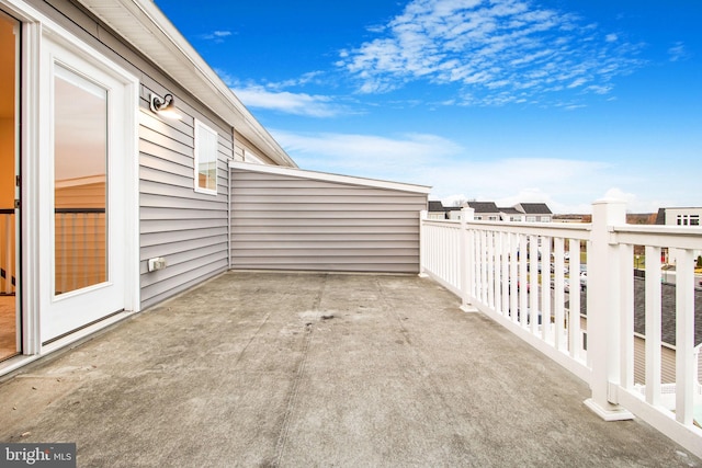 view of patio with a balcony