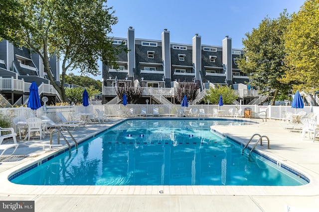 view of pool featuring a patio area