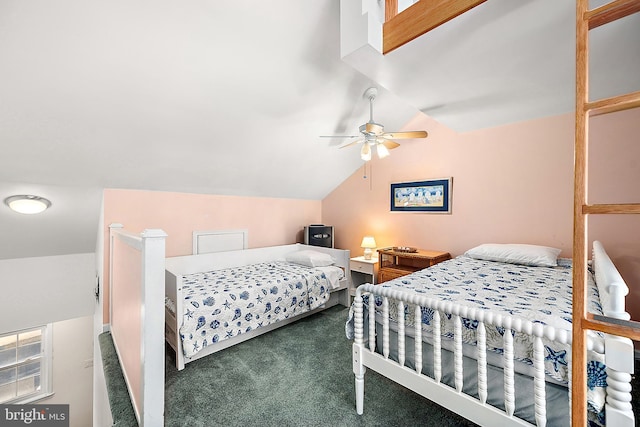 carpeted bedroom with vaulted ceiling and ceiling fan