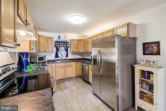 kitchen with light brown cabinets, sink, and stainless steel appliances