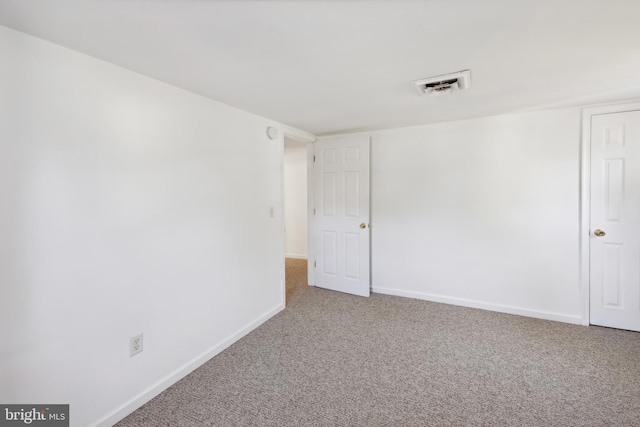 empty room featuring carpet