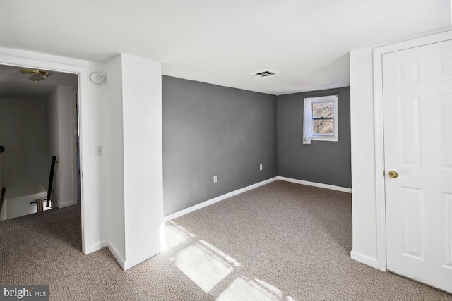 unfurnished room with carpet floors