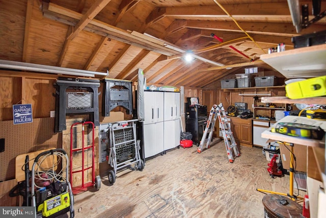 basement featuring a workshop area and light hardwood / wood-style flooring