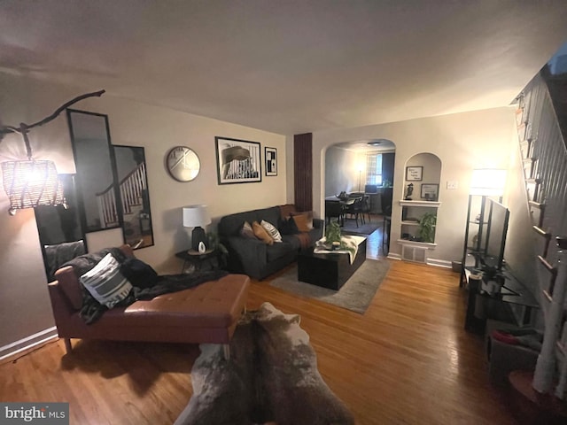 living room with hardwood / wood-style flooring