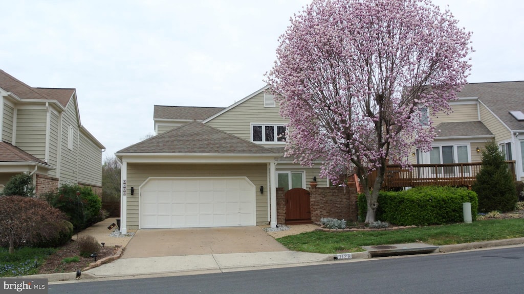 view of front of property featuring a garage