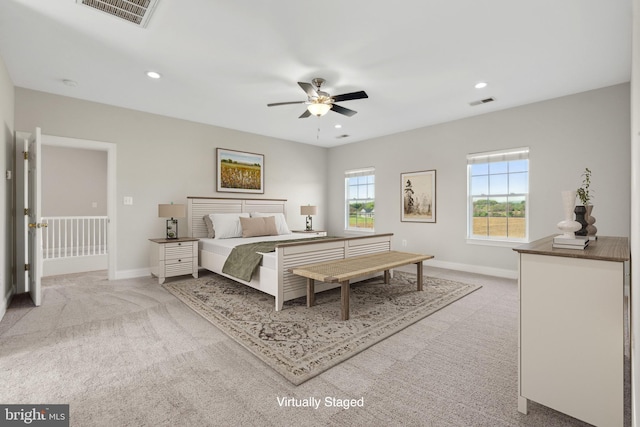 carpeted bedroom with recessed lighting, baseboards, and visible vents