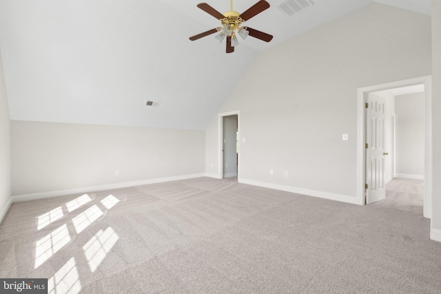 unfurnished living room featuring carpet floors, ceiling fan, visible vents, and lofted ceiling
