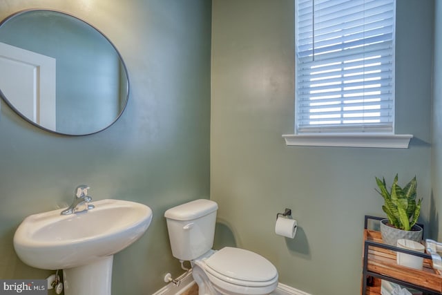 bathroom with sink and toilet