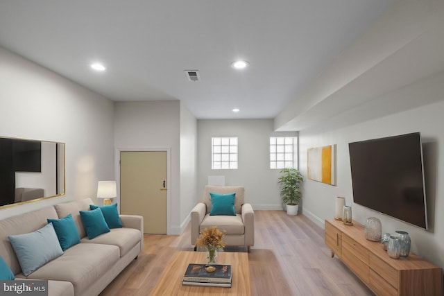 living room with light hardwood / wood-style floors