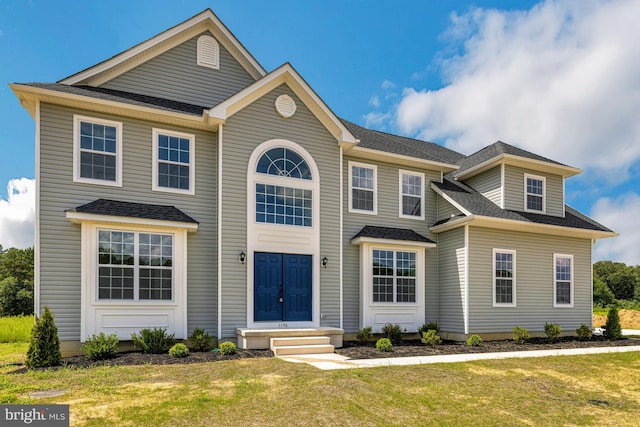 view of front facade featuring a front lawn