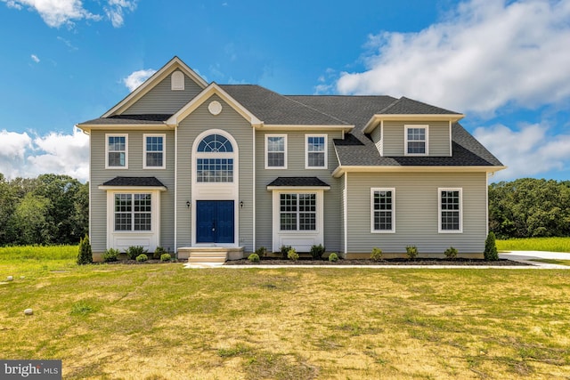 view of front of property featuring a front yard