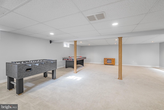 game room with carpet flooring and a paneled ceiling