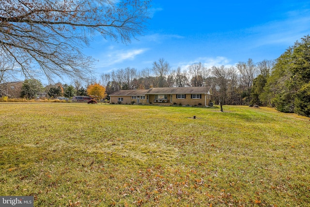 view of front of home featuring a front lawn