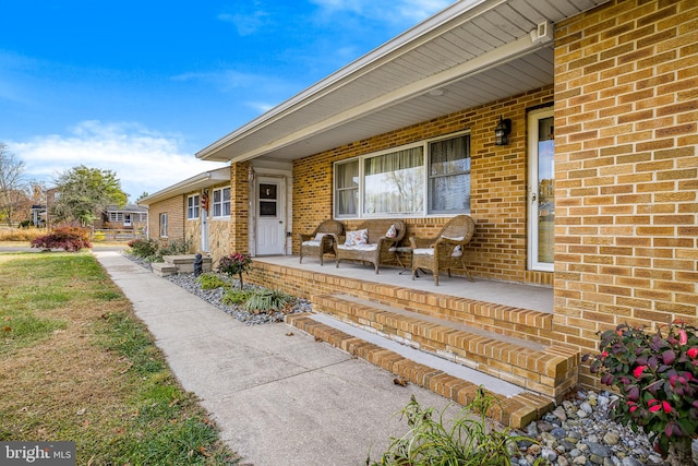 property entrance featuring covered porch