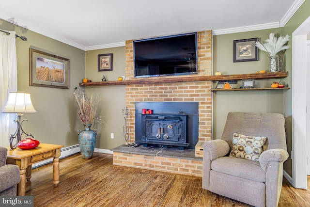 living room featuring wood-type flooring, a baseboard radiator, a wood stove, and crown molding