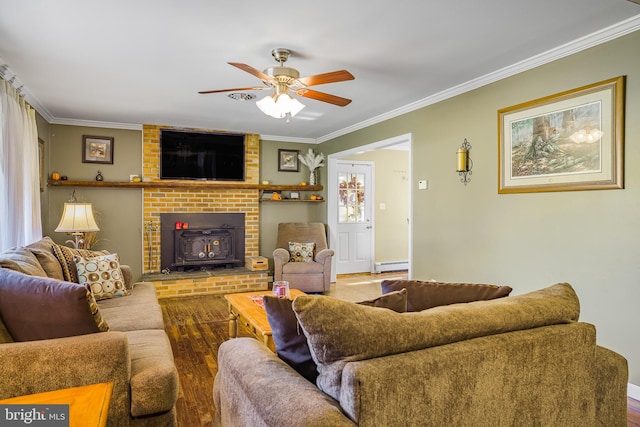 living room featuring hardwood / wood-style floors, crown molding, and baseboard heating