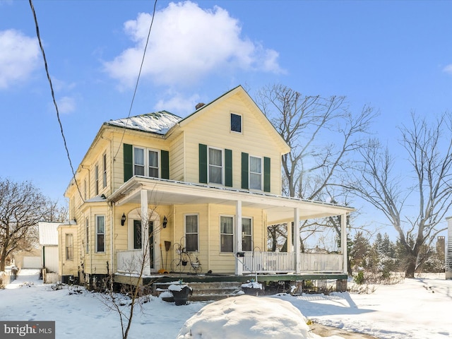 farmhouse with a porch