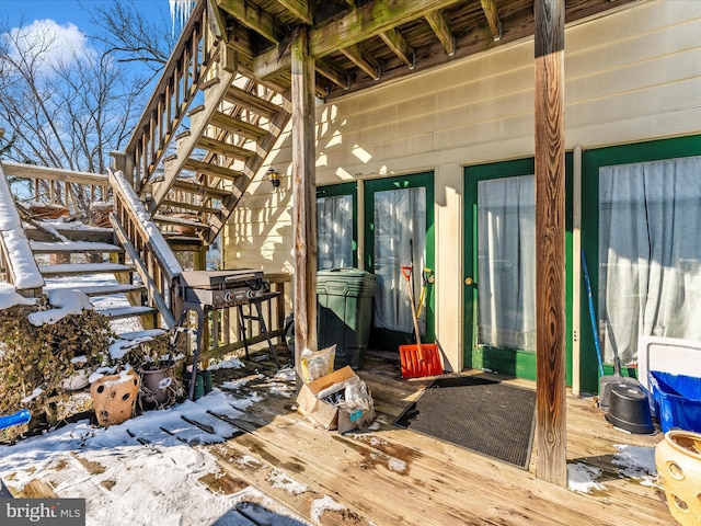 view of snow covered deck