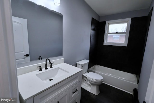 full bathroom featuring tile patterned flooring, vanity, toilet, and bathing tub / shower combination